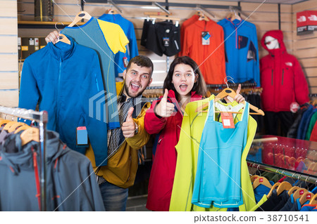 Couple enjoying new sportswear Couple enjoying new sportswear 38710541