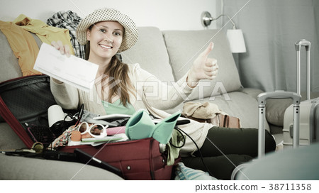 Woman getting ready for holidays 38711358