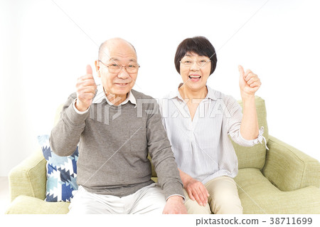 Senior couple making a good sign Senior couple making a good sign 38711699