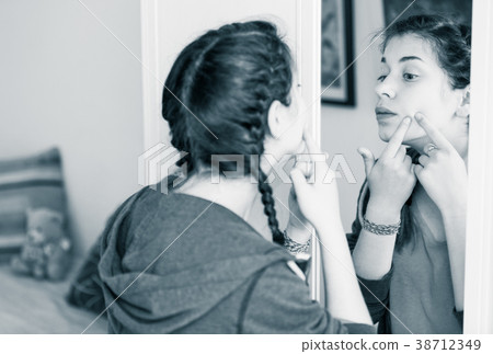 Girl cleaning pores 38712349