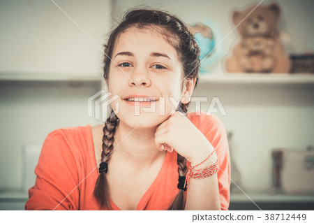 Girl posing playfully 38712449