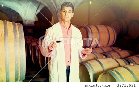 taster of winery posing with wine taster of winery posing with wine 38712651