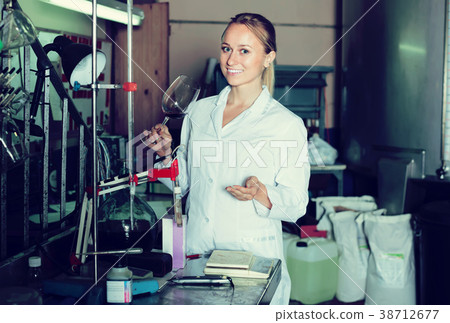 Female specialist in winery laboratory 38712677