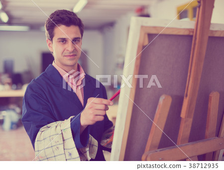 Artist painting on canvas Artist painting on canvas 38712935