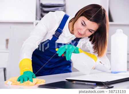 Female cleaner at work 38713133