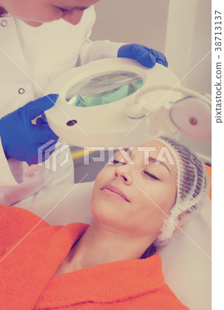 Young client ready for beauty procedures Young client ready for beauty procedures 38713137