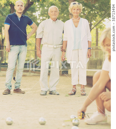 Mature people playing bocce 38713494