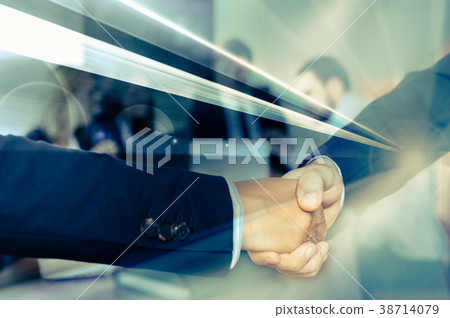 Businesspeople shaking hands Businesspeople shaking hands 38714079