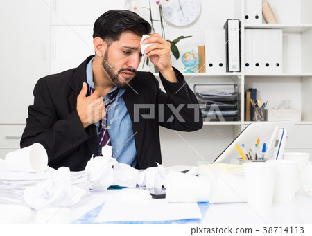 Man employee is indignant because he is having issues with project Man employee is indignant because he is having issues with project 38714113