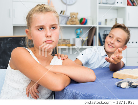 Boy is excusing for the offendedly girl Boy is excusing for the offendedly girl 38715955