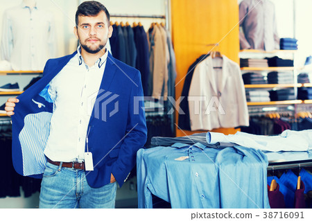 male buyer shows off his jacket male buyer shows off his jacket 38716091