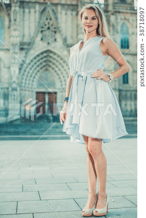Portrait of cheerful woman at the street 38718097