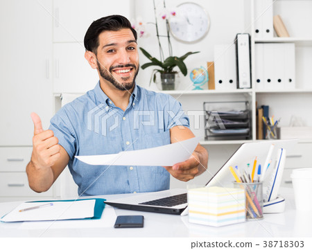 Excited male is talking about successful contract 38718303