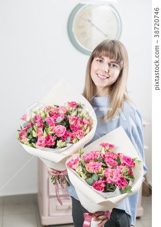 Two flowers bouquet. Sunny spring morning. Young 38720746