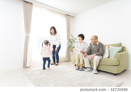 Happy Three Generation Family Playing With Dog In Family Happy Three Generation Family Playing With Dog In Family 38720896