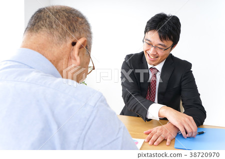 Salesman and seniors Salesman and seniors 38720970