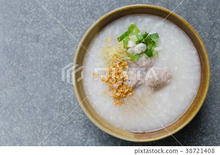 Asian Rice Porridge with Meatballs for Breakfast. 38721408