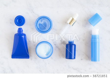 Flatlay skincare cosmetic products on marble 38721851