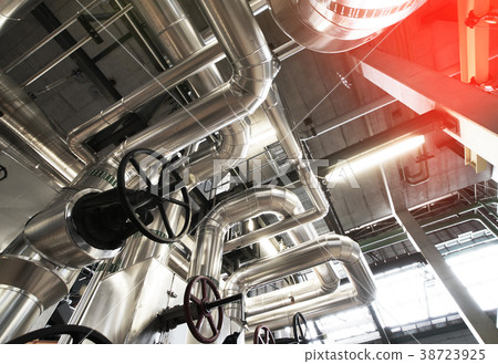 different size and shaped pipes and valves  38723925