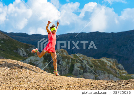 Girl skyrunner trains downhill 38725026