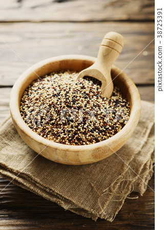 Mix of raw red, white and black quinoa  38725391
