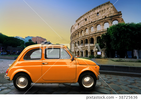 Retro car on background of Colosseum in Rome Italy 38725636