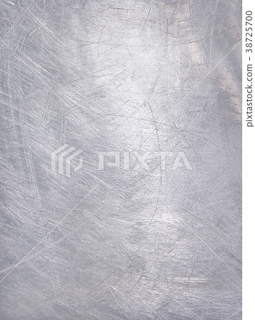 Worn metal plate steel background. Silver foil. Worn metal plate steel background. Silver foil. 38725700