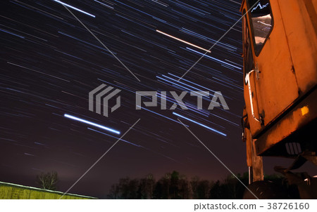 Old tractor and star trails, 38726160