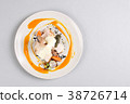 chicken breast with vegetables on a white plate. 38726714