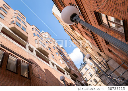 European street with houses and blue sky European street with houses and blue sky 38728215