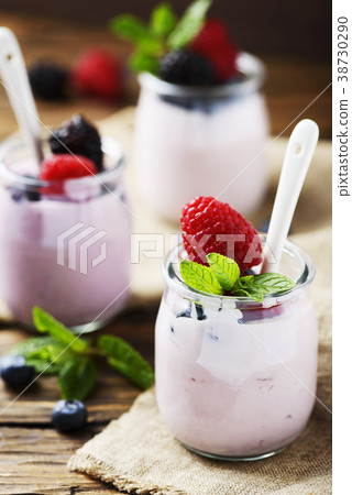 Healthy summer yogurt with berry and mint Healthy summer yogurt with berry and mint 38730290