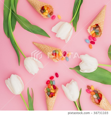 Pattern of colorful bright candy in waffle cones Pattern of colorful bright candy in waffle cones 38731103