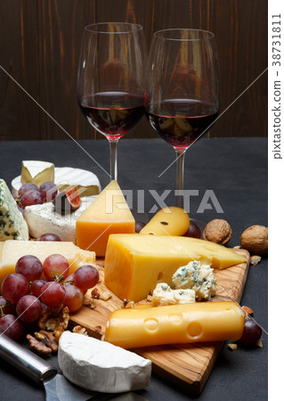 Wine and Various types of cheese - parmesan, brie 38731811