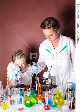 Two pupils at chemistry lesson Two pupils at chemistry lesson 38732031