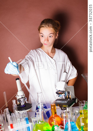 Thoughtful funny schoolgirl Thoughtful funny schoolgirl 38732035