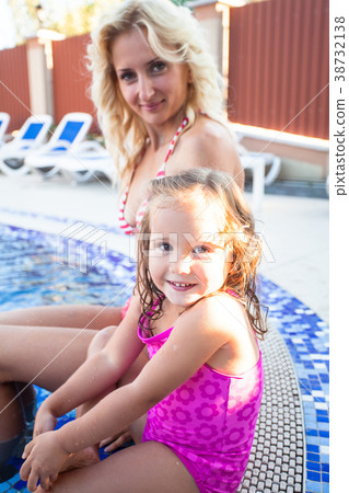 Mother and child at the swimming pool Mother and child at the swimming pool 38732138