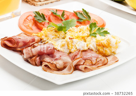 Scrambled eggs with bacon Scrambled eggs with bacon 38732265