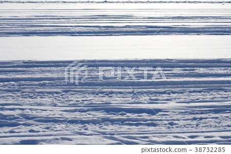 Snow background with traces. 38732285