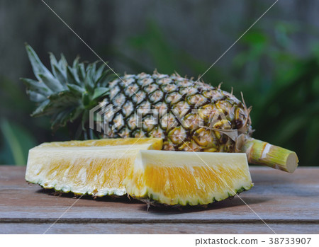 Fresh pineapple on wooden background. Fresh pineapple on wooden background. 38733907
