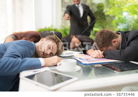 Tired business worker at conference in the office. 38735446