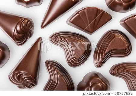 assorted chocolates on white assorted chocolates on white 38737622