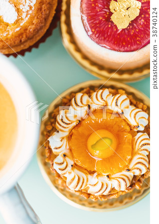 Handcrafted fruit tarts and pastries with coffee Handcrafted fruit tarts and pastries with coffee 38740124