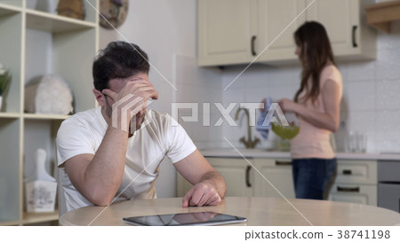 Nervous young woman quarreling with man, annoyed 38741198