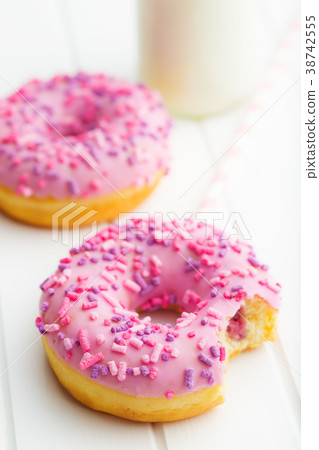 A bitten donut. 38742555