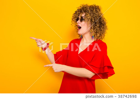 Attractive woman with short curly hair 38742698