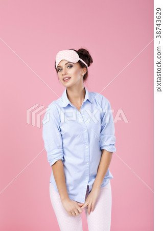woman in pajamas and mask for sleeping woman in pajamas and mask for sleeping 38743629
