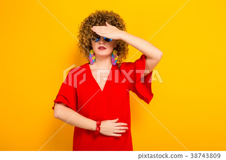 Attractive woman with short curly hair 38743809