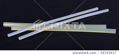White hot glue sticks for handmade, isolated on White hot glue sticks for handmade, isolated on 38743817