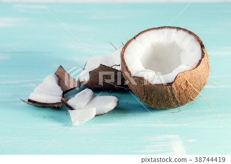 Coconut on wooden table on bright blurred Coconut on wooden table on bright blurred 38744419