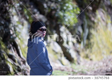 Sporty woman outdoors Sporty woman outdoors 38745768